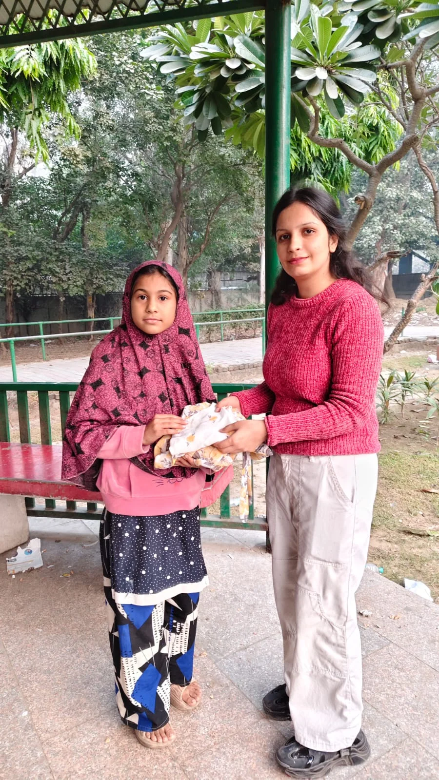 Volunteers handing out items