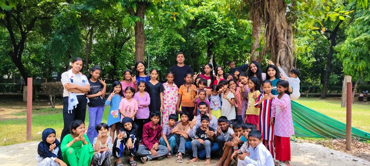 Volunteers and children together